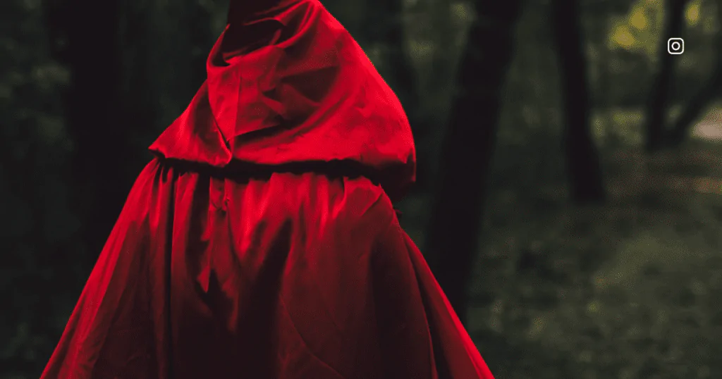 "Captions inspired by Little Red Riding Hood for enchanting Instagram posts."